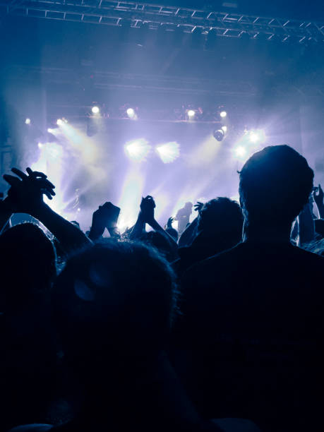 istock Filming concert on smart phone 1253541336