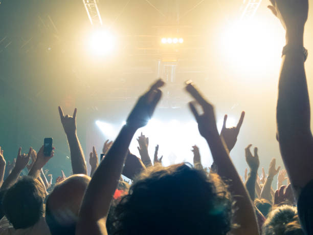istock Filming concert on smart phone 1253541968