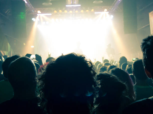 istock Filming concert on smart phone 1253541971