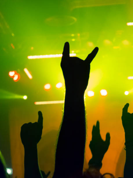 istock Filming concert on smart phone 1253542121