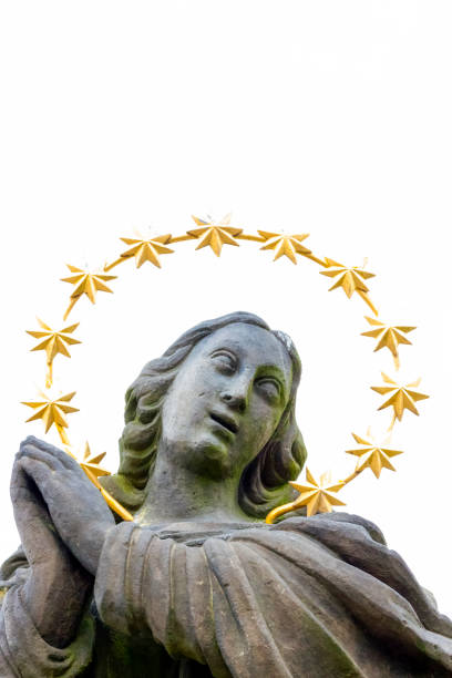 istock Virgin mary with rhinestone halo, white background with copy space 1253543075