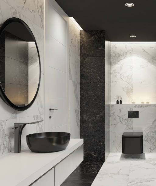 istock Luxurious modern home spa bathroom with black and white marble tiles 1253545456