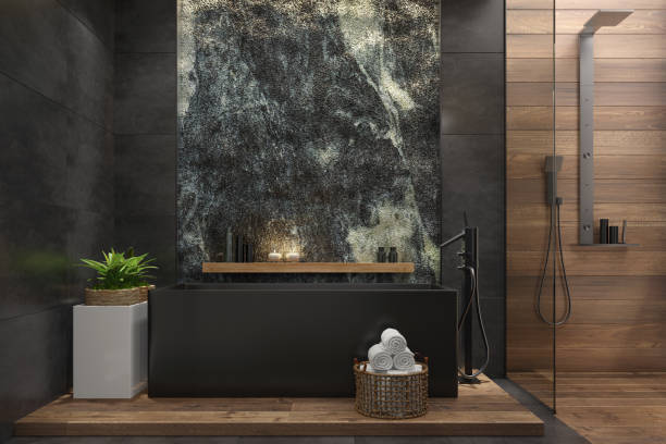 istock Spa bathroom in luxurious modern villa with huge natural rock wall 1253545479