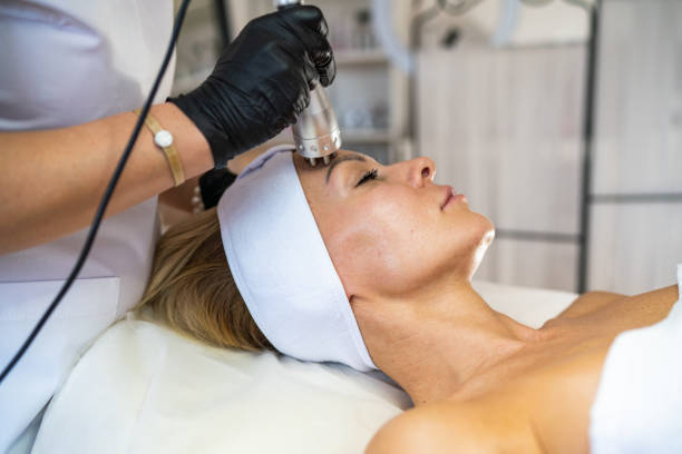 istock Rf lifting procedure in a beauty salon 1253545568