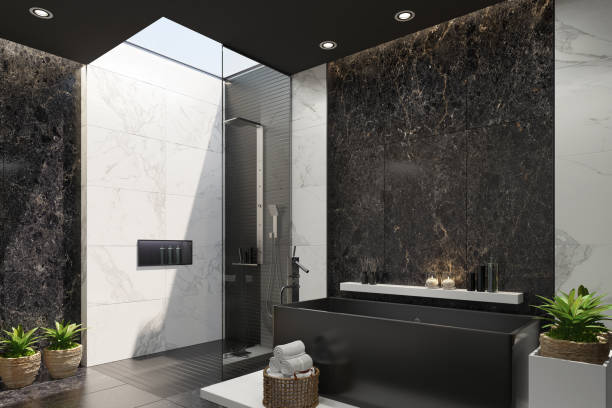 istock Luxurious modern home spa bathroom with black and white marble tiles 1253546375