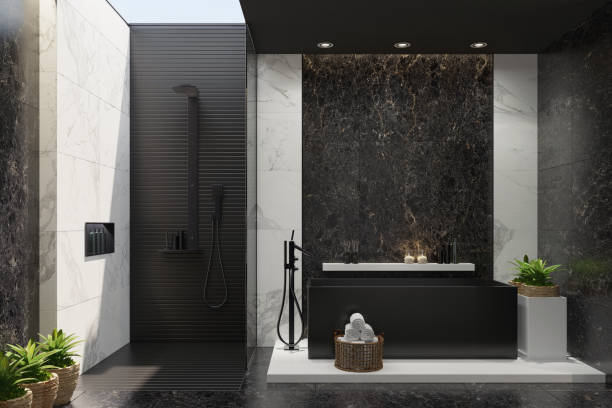 istock Luxurious modern home spa bathroom with black and white marble tiles 1253546463