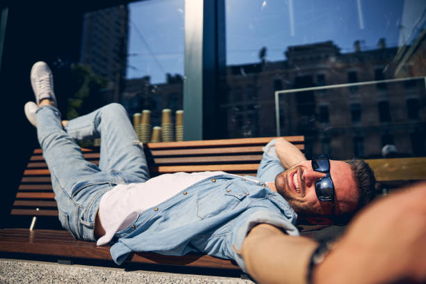 istock Positive delighted man that looking at camera 1253546686