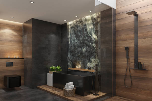 istock Spa bathroom in luxurious modern villa with huge natural rock wall 1253546826