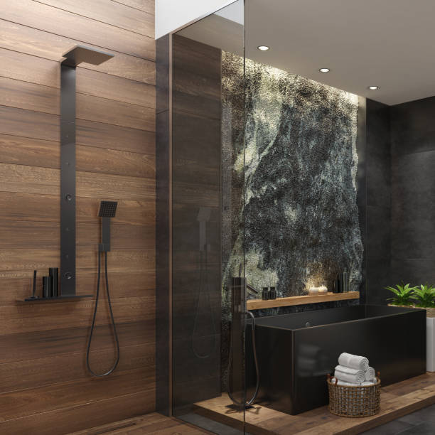 istock Spa bathroom in luxurious modern villa with huge natural rock wall 1253547518