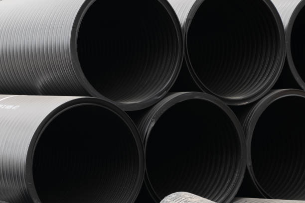istock Large Pipes Stacked at a Local Construction Site 1253554961