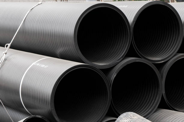 istock Large Pipes Stacked at a Local Construction Site 1253554962
