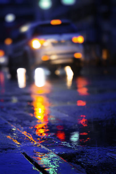 istock Night scene of city light after hard rain fall. 1253555161