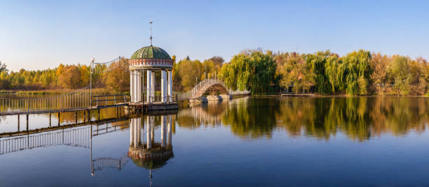 Gazebo in the middle of the lake at fall Gazebo in the middle of the lake at fall in Ukraine, Cherkasy Oblast, Cherkasy cherkasy stock pictures, royalty-free photos & images