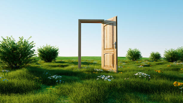 istock opened door. Portal through nature. 3d rendering. 1253556825