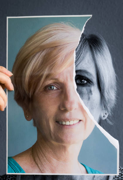 istock Woman hiding behind photo 1253557625