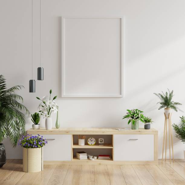 istock Mock up poster frame on cabinet in interior. 1253561748