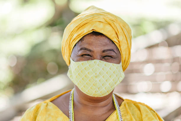istock Covid-19: Afro Brazilian religious wearing protection mask 1253561956