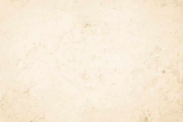 istock Cream concreted wall for interiors or outdoor exposed surface po 1253570243