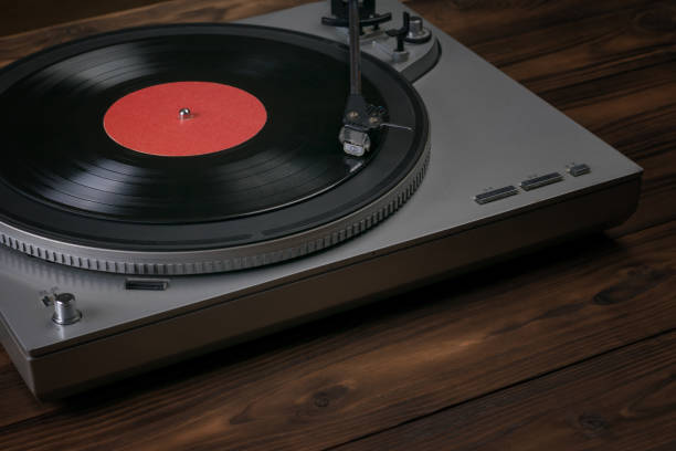 istock A red vinyl record player on a wooden table. 1253574672