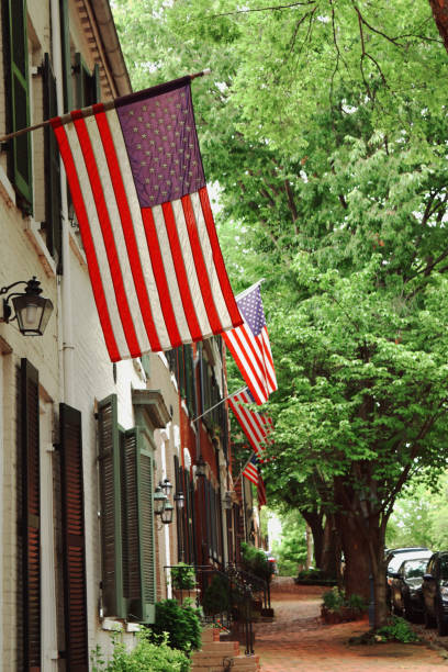 istock American flags displayed on a historic street 1253574704