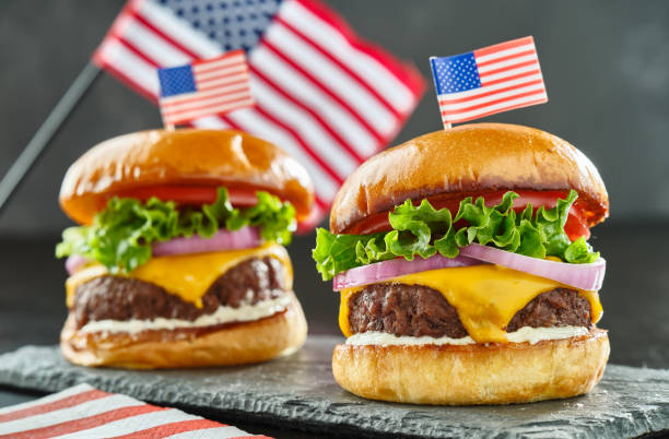 istock 4th of july themed cheeseburgers with mini flags 1253576704