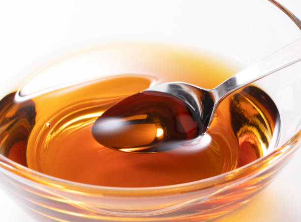 istock Scoop up the sesame oil with a spoon 1253576739