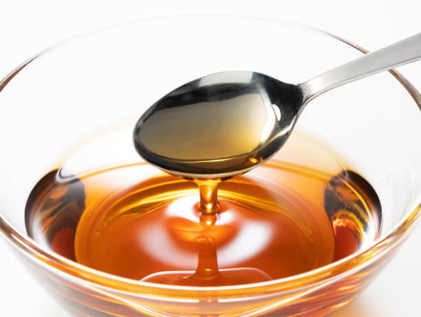 istock Scoop up the sesame oil with a spoon 1253579621