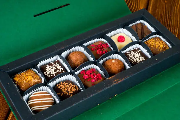 delicious chocolate candies in gift box, diagonal shot