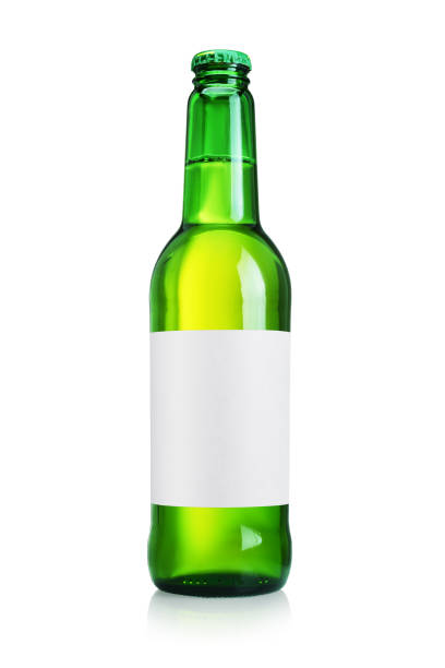 istock Green beer bottle with clean label isolated on white. 1253582188