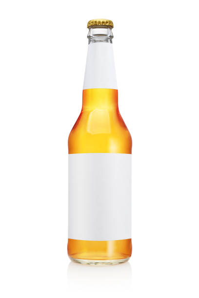 istock Transparent yellow beer bottle isolated on white background. 1253582316