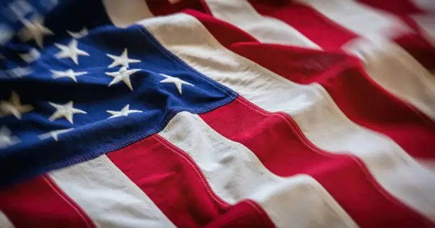 Photo of USA flag, US of America sign symbol background, closeup view