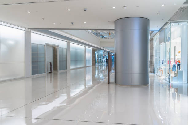 istock modern shopping mall interior with shopfront and corridor. 1253594349