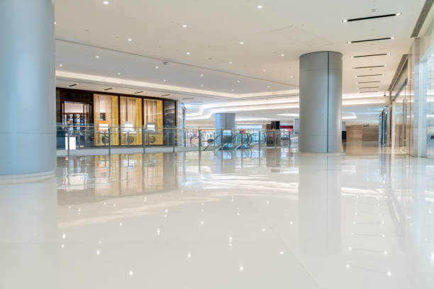 modern shopping mall interior with shopfront and corridor. stock photo
