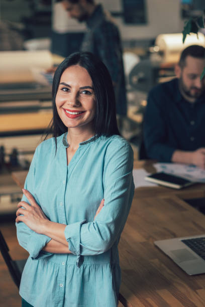 istock Cute pretty lady posing indoors and smiling cheerfully 1253596005