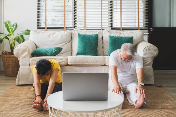 istock Asian old senior workout exercise and doing yoga at home 1253597795