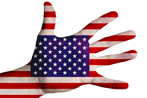 Open palm with the image of the USA flag. Multipurpose concept. Image on a white background. Isolate