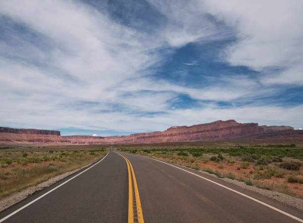 istock An asphalt road with beautiful mountain scenery 1253603310