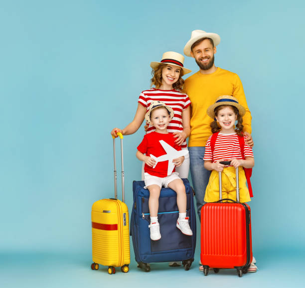 istock Modern happy family ready for trip 1253605184