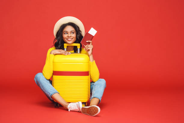 istock Ethnic woman dreaming about vacation 1253605698