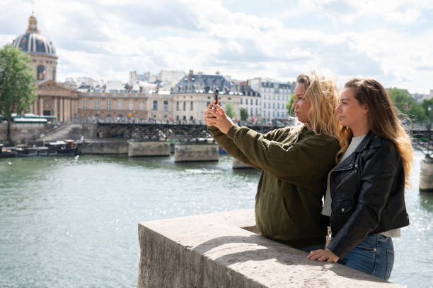 istock Friends in Paris taking selfie 1253610608