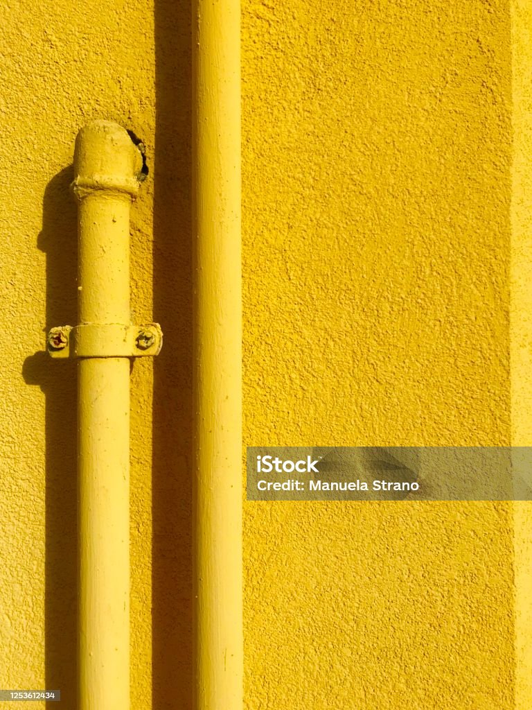Think Yellow A yellow wall around the city Abstract Stock Photo