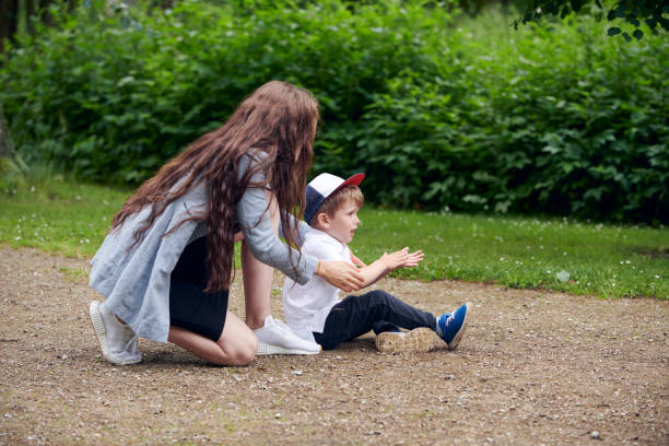 istock Mother and 4 year old child on park in park 1253612849