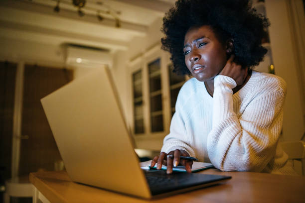 istock Woman works from home late at night 1253616363