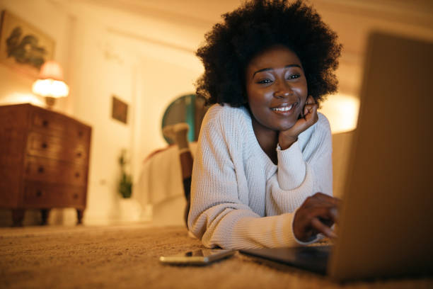istock Young woman enjoys at home 1253617345
