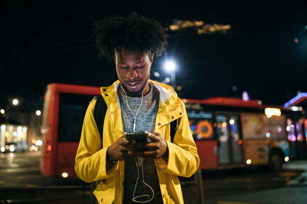 istock Young man enjoying a night walk 1253617545