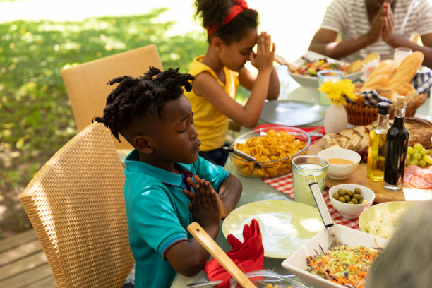 istock Family eating together at table 1253622826