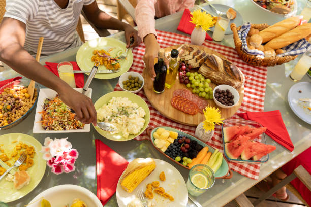 istock Family eating together at table 1253624684