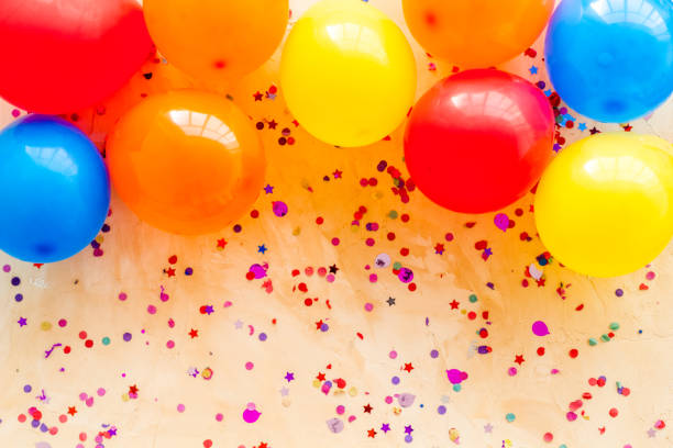 istock Flat lay with ballons - party concept - on beige background top-down copy space 1253626645