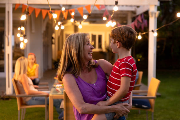 istock Grandmother and grandson hugging each other 1253629348