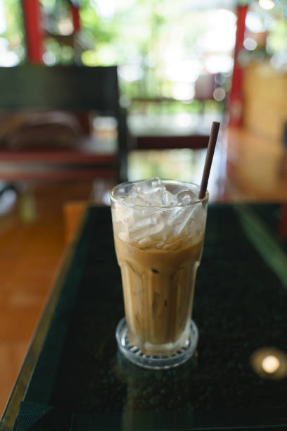 istock Cold ice milk coffee in glass cup 1253631594